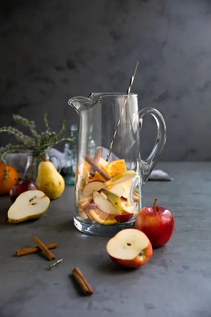 Clear pitcher of Easy Fall Sangria